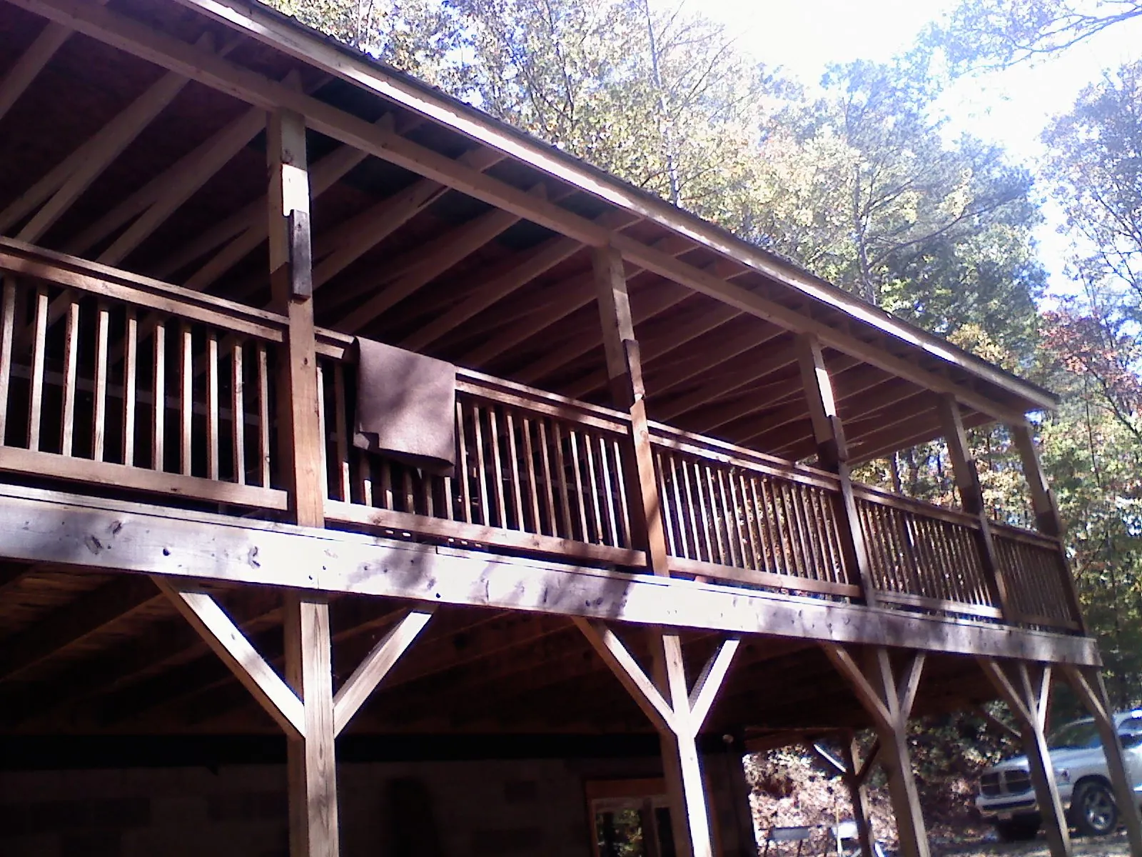 Timber framing under a new elevated porch and deck — Roof Leak Repair in Aaronsburg by Roofing Brothers